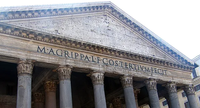 Close view of the frieze inscription M AGRIPPA L F COS TERTIVM FECIT above the portico columns, with the pediment over it